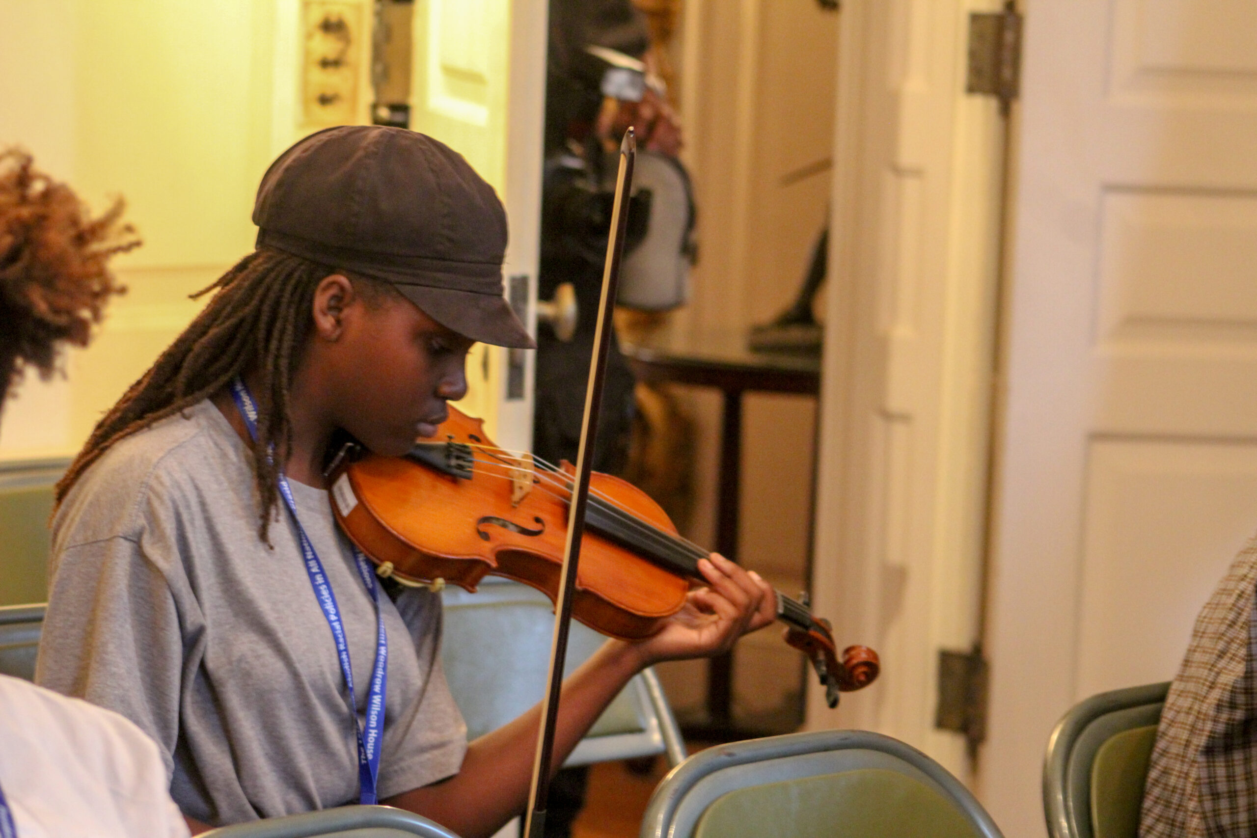 Violinist in workshop