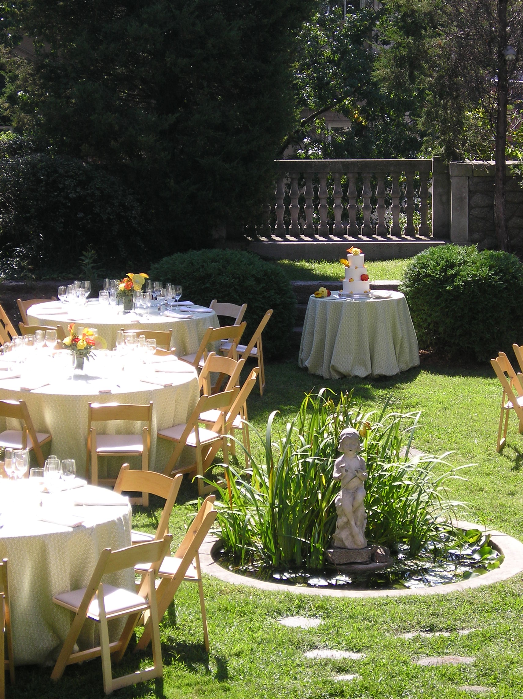 Round tables set up in the lower garden